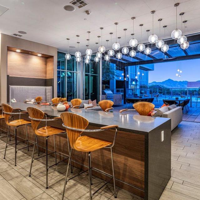 Broadstone Scottsdale Quarter – Elegant Dining Room with Twilight Mountain View